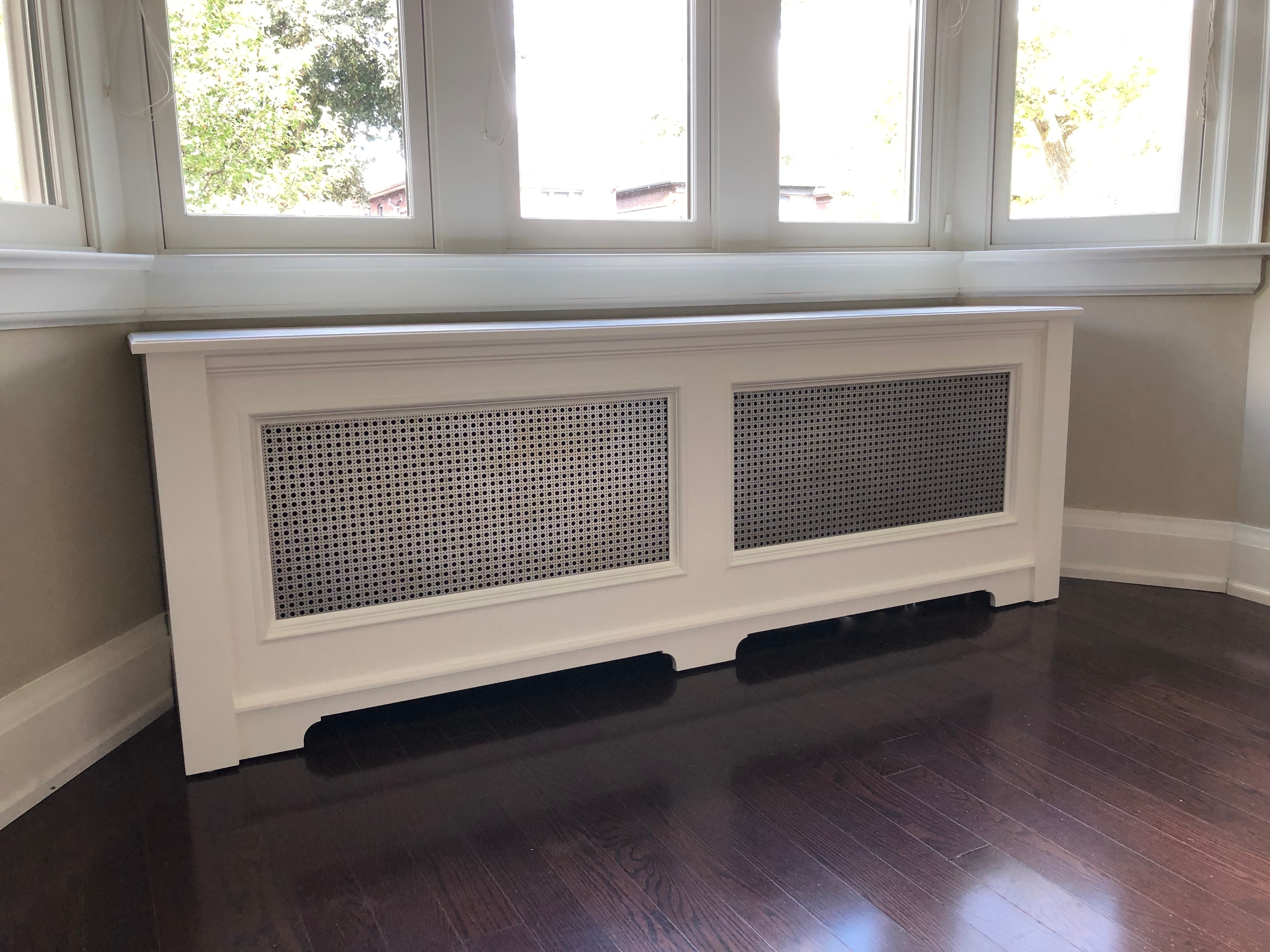 White radiator cover window seat
